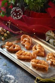 Struffoli, pizzelle, anginetti, cartellate, fig cookies, pignoli and many more. Caragnoli Italian Christmas Fritters She Loves Biscotti