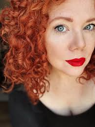 Curly red hair, blue eyes, and freckles all combine to make a very rare  look and I love it. So many years of work to get to a place of not being