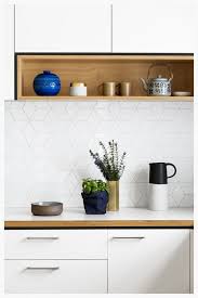 13 Sleek White Modern Kitchen Backsplash Ideas Hunker Modern Kitchen Backsplash White Modern Kitchen Kitchen Splashback Tiles
