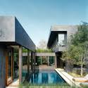 The black house's rectangular massing was divided into blocks by key site axes, a view from the pool to a large populus tree, and a previous path to the site. Black House Ar Design Studio Archdaily