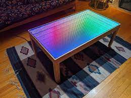 The storage space below gives. This Infinity Mirror Coffee Table Puts Other Living Room Furniture To Shame Arduino Blog