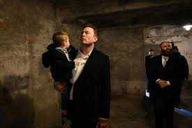 Elon Musk visits Auschwitz after uproar ...