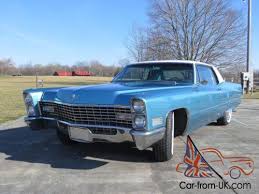 Finished in classic and desired venetian blue with beautiful white leather interior and matching power convertible top. 1967 Cadillac Deville Coupe Deville