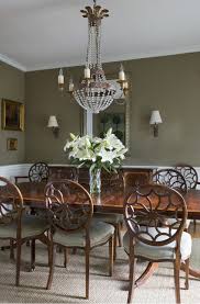 So choose a set that works for every occasion! Simple And Clean Traditional Sconces And Chairs Flank The Sideboard Cha Farmhouse Style Dining Room Traditional Dining Rooms Mid Century Style Dining Chairs