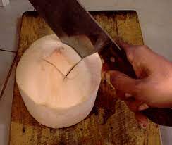 First, a word about finding young coconuts: How To Open A Young Coconut