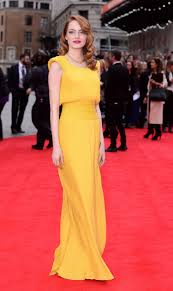 Once you see it, you can't unsee it. Emma Stone S Saint Laurent Jacket Atelier Versace Yellow Dress Glamour