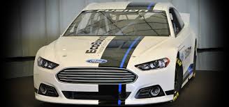 The car of tomorrow's front bumper is much higher than the current nascar car. New Look Nascar Sprint Cup Ford Fusion Racecar Engineering