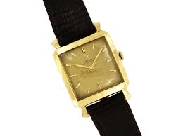 Cartier colisee |18k gold with diamonds on the bezel | case size is about 23.5mm | twc 0.75ct diamond | scratch resistant sapphire crystal | 6.5″ band | movement is a cartier quarts battery | no box or papers, vintage watch | south bay watches one year limited warranty | $8,500.00. Omega Yellow Gold Rare Exclusive Vintage 14k Filled Square Shaped Watc Crown Jewelers