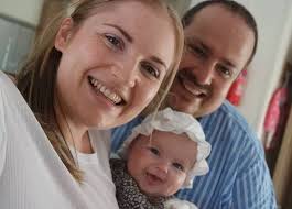 Miracle baby born with bowel OUTSIDE her body defies the odds to celebrate  first birthday