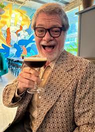 Meat manager with brown hair and short stature