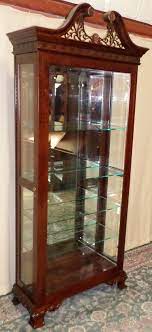 Search for a company, phone number companies. Jasper Mahogany Curio Cabinet Lighted Glass Display Side Load Fretwork Vintage 1832118824