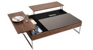 Featuring an adjustable height surface which provides the perfect height for you when you work or drink a cup of coffee, and the hidden storage underneath the table top and the storage space below the table top. Coffee Table With Hidden Storage Space By Bo Concept Home Reviews