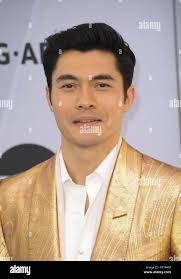 Henry golding hi-res stock photography and images