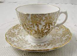 Check spelling or type a new query. Royal Vale Gold Chintz Tea Cup And Saucer Vintage Bone China Etsy Tea Cups Antique Tea Cups Cup And Saucer
