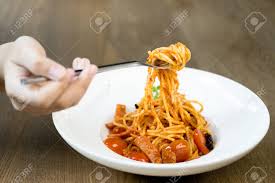 Italian Food Hand Holding Fork With Spaghetti Bolognese In White Stock Photo Picture And Royalty Free Image Image 91199204