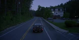 Car driving through the empty road and focus on mirror. Car Driving Down A Country Road At Night Stock Video Footage At Filmsupply