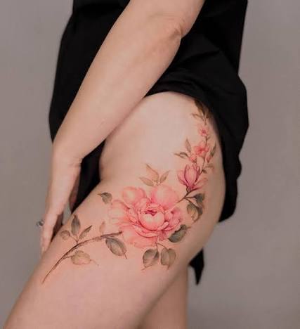 Nancy Fine Line Watercolor Tattoo | Soft looking, fine line with a bit of watercolor flowers🫶🫶 Done @dongtattoostudio | Instagram