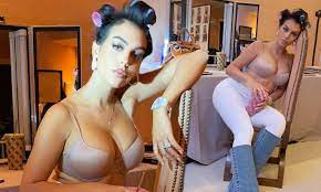 Georgina Rodriguez looks stunning in a nude bra as she poses for  behind