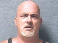 Sexton accused of robbery, suspected in bank heists