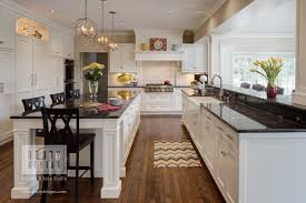 The natural wood kitchen cabinets are my favorite, though. Painted Cabinets Vs Stained Cabinets Drury Design
