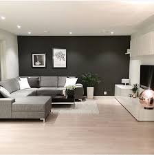 Un Mur Noir Pour Le Salon Deco Decoration Amenagement Inspiration Moderne Parquet Blanc Deco Salon Decoration Salon Appartement Decor Salon Maison