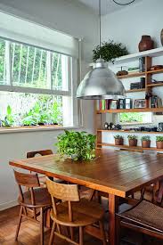 Apartamento No Rio De Janeiro E Repleto De Moveis De Sergio Rodrigues Dining Chairs Dining Design
