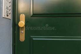 Light green with a grey exterior. Green Door With Golden Knob Stock Image Image Of Dark Home 80471325