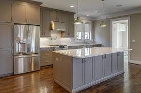 Hodedah long standing kitchen cabinet with top & bottom enclosed cabinet space, one drawer, large open space for microwave, white. Medium Gray Cabinets With White Countertop And Dark Floor Kitchen Design Contemporary Kitchen Cabinets Online Kitchen Cabinets