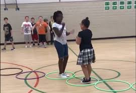 Do you work with children at a church? Ruthless New Game Includes Hopping Hula Hoops And Rock Paper Scissors