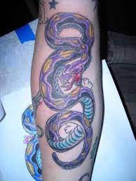 Purple Snake Tattoo On Leg Leg Tattoos Tattoos Snake Tattoo