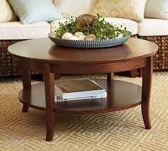 The board deco give this table with a chair in the same spirit as palermo chair. Metropolitan Round Coffee Table Coffee Table Coffee Table Pottery Barn Table