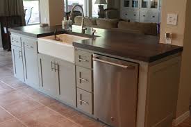 You can have a smaller sink in the kitchen island, with a larger sink or dishwasher located in the outer cabinets. Renovation Realities Part Vi Before After Kitchen Island With Sink Building A Kitchen Kitchen Island With Sink And Dishwasher