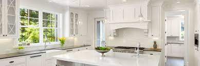 Lighten and brighten this tuscan style kitchen with a new plaster hood and white marble counters and backsplash. 8 Ways To Create A Warm And Welcoming White Kitchen Coldwell Banker Blue Matter