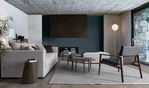 A study in contrasts, this is an elegant pairing of wood with the clean lines of a geometric bronzed metal base. Trendy Round Coffee Table Ideas Contemporary Style