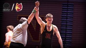 Wyoming Native Signs with Wolves Wrestling
