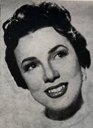 Photo From Downbeat Magazine October 6, 1954 ELEANOR RUSSELL, 23 was born  and reared in New York, where she attended Brooklyn College briefly. She  may be heard with the Les Elgart Orchestra