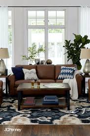 Creating A Stylish Living Area Is Easy With These Tips Start With Your Sofa The Cen Brown Couch Living Room Brown And Blue Living Room Brown Walls Living Room