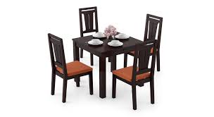 The return on investment you. Arabia Storage Martha 4 Seater Dining Table Set Urban Ladder