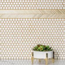 Be Bold When Remodeling Your Kitchen White Penny Tiles Accented With Gold Grout And Combined Wi Penny Tile Backsplash Penny Tiles Bathroom Penny Backsplash