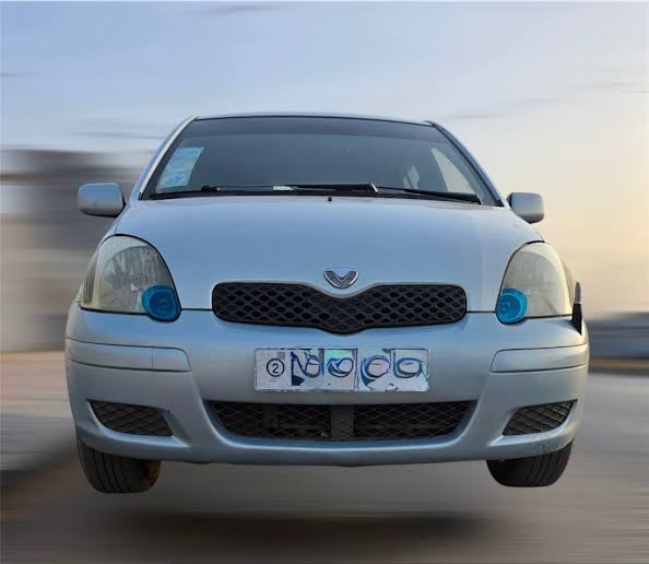 2004 Toyota Vitz hatchback with Code 2 registration, AI generated