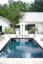 If the pool uses standard white or grey plaster (or a similarly light color), this can result in more noticeable stains, scaling, and shading from regular wear and tear. Dark Bottom Pool For The Ojai House A House In The Hills