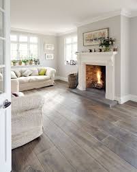 What paint colors work best with stained wood trim? 10 Times Gray Was The Perfect Color For Everything Bethany Mitchell Homes Living Room Wood Floor Farm House Living Room Summer Living Room