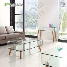 The table top is a tempered glass of 8 mm, which can be executed in 3 colors (silver, graphite and bronze). China Home Living Room Modern Clear Glass Center Coffee Table With Beech Wood Leg China Coffee Table Glass Coffee Table