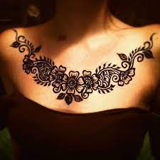 Most ink lovers would know how traditional henna looks. Intricate Chest Henna Henna Tattoo Designs Henna Tattoo Tattoo Designs
