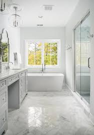 Polished Marble Herringbone Bath Floor Tiles Bringing Dimension And Sheen To A White And L White Marble Bathrooms Herringbone Marble Floor Light Grey Bathrooms