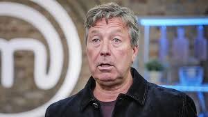 BBC sacked Masterchef host John Torode after he 'used the N-word twice  while singing along to Kanye West song.' Torode, 59, rapped the lyrics to  Gold Digger during after-work drinks 6 -