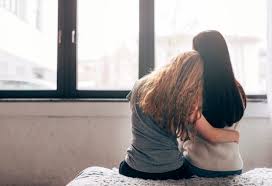 Lesbian girl shaves her hair bald with a trimmer. Free Photo Lesbian Couple Embracing Near Window