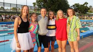 Mccarthy Catholic College Students Compete At Carnival Photos College Catholic Colleges College Students Photo