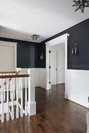 Turn Up Your Decor With These Mesmerizing Lighting Fixtures From Modern Lamps To Ceiling Lights Your Modern Home Decor Wil Black Walls Home White Wainscoting