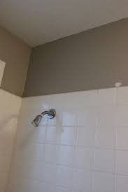 I cleaned then scored the tile with a diamond hole saw drill bit used for if it's drywall underneath id tear it off too avi to the studs and start with fresh mold resistant board too. How To Remove A Tile Tub Surround With Metal Mesh